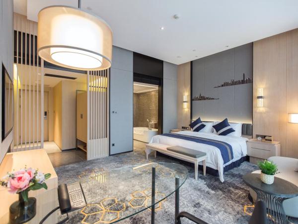 Chongqing Liyuan Hotel : photo 5 de la chambre chambre lit king-size exécutive