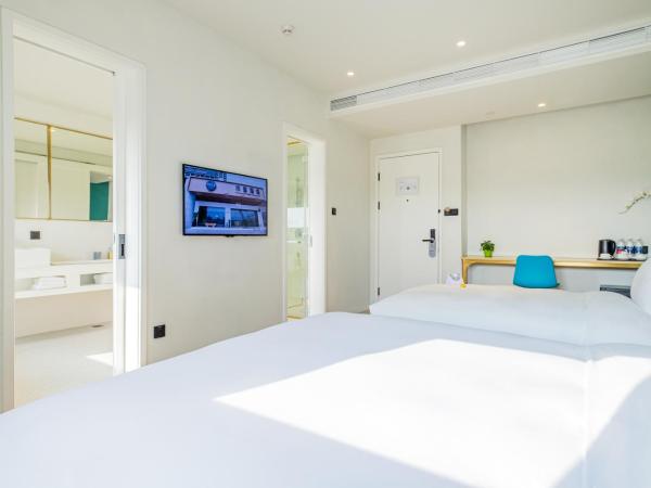 PACE HOTEL Suzhou Renmin Branch : photo 3 de la chambre chambre familiale avec salle de bains privative