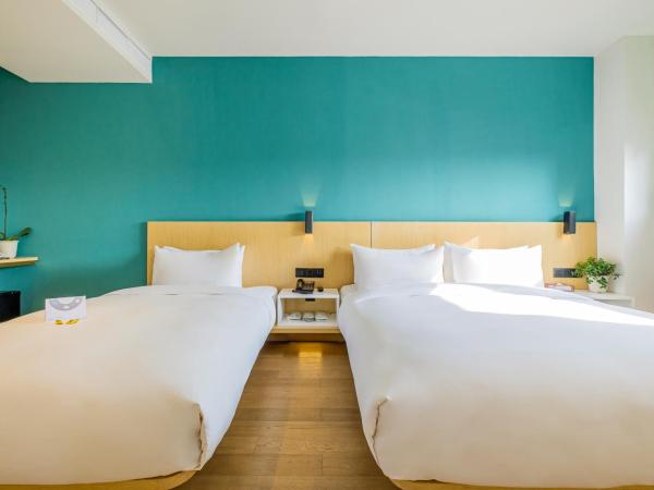 PACE HOTEL Suzhou Renmin Branch : photo 5 de la chambre chambre familiale avec salle de bains privative