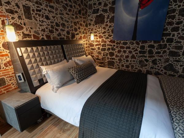 Mumedi Design Hotel : photo 6 de la chambre suite deluxe avec lit king-size