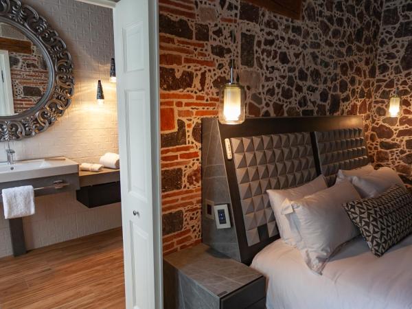 Mumedi Design Hotel : photo 3 de la chambre suite deluxe avec lit king-size