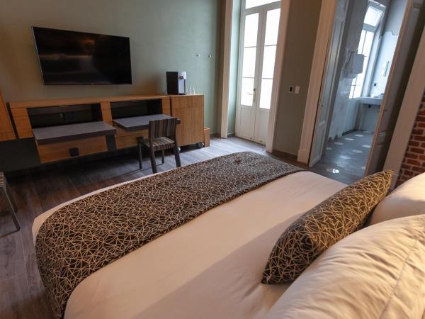 Mumedi Design Hotel : photo 2 de la chambre suite deluxe avec lit king-size