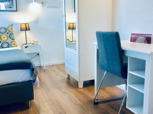 Hotel Botanico de Coimbra : photo 2 de la chambre chambre double ou lits jumeaux