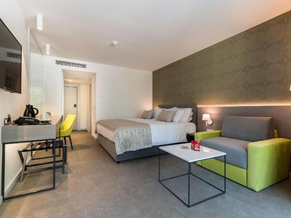 Boutique Hotel Mirjam : photo 9 de la chambre chambre double deluxe avec balcon - vue sur jardin