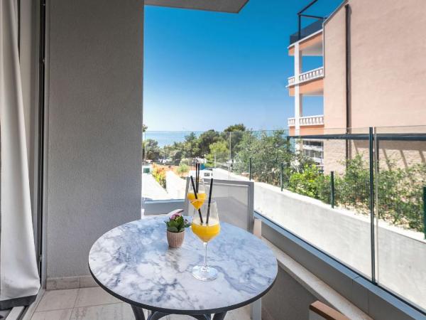 Boutique Hotel Mirjam : photo 1 de la chambre chambre double deluxe avec balcon - vue sur jardin