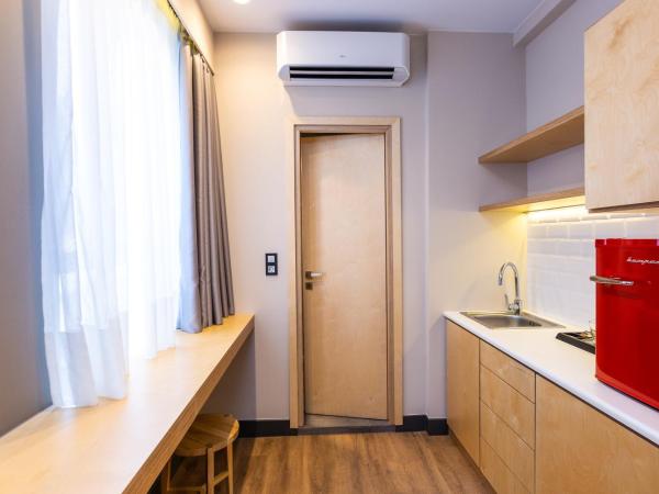 St. Bjur Suites : photo 4 de la chambre chambre triple