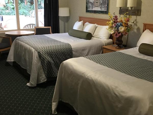 Travelodge by Wyndham Winnipeg East : photo 1 de la chambre chambre lit queen-size deluxe - non-fumeurs