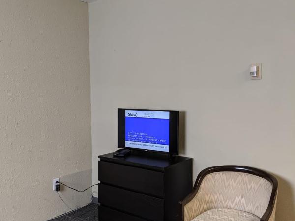 The Cavalier Inn : photo 1 de la chambre suite lit queen-size deluxe