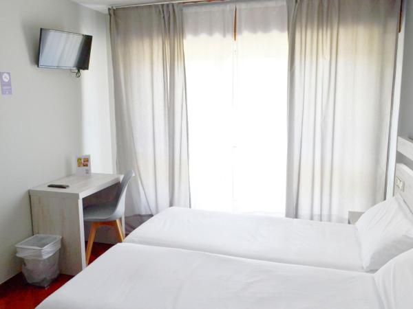 Alda Puerta Coruña : photo 3 de la chambre chambre triple