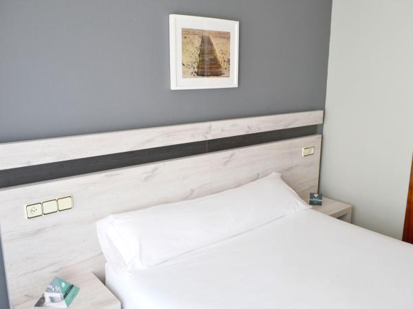 Alda Puerta Coruña : photo 6 de la chambre chambre simple