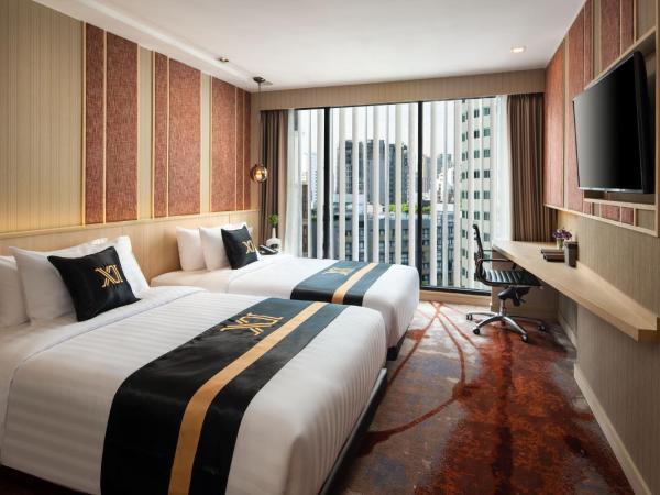Eleven Hotel Bangkok Sukhumvit 11 : photo 1 de la chambre grande chambre deluxe lits jumeaux