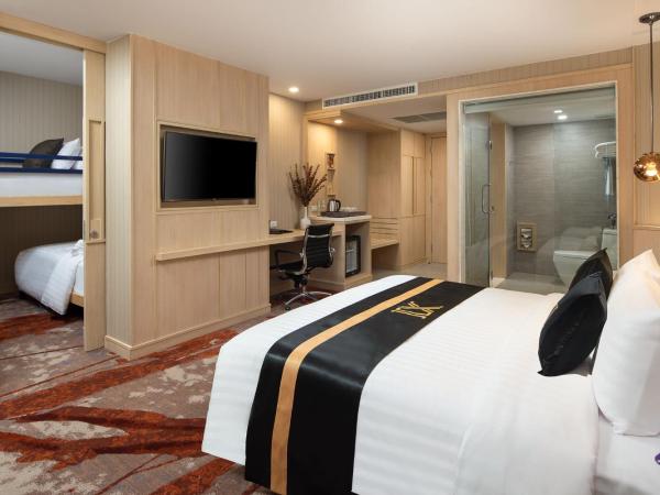 Eleven Hotel Bangkok Sukhumvit 11 : photo 2 de la chambre hébergement familial avec lits superposés