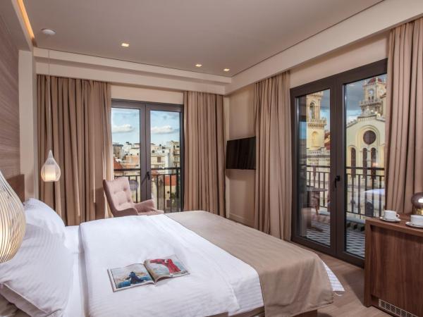 Metropole Urban Hotel : photo 1 de la chambre chambre de luxe avec balcon - vue sur ville