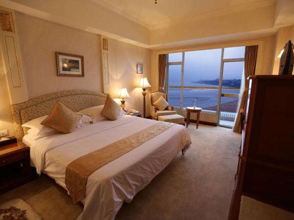 Huiquan Dynasty Hotel Qingdao : photo 6 de la chambre chambre lits jumeaux exécutive avec vue sur la mer
