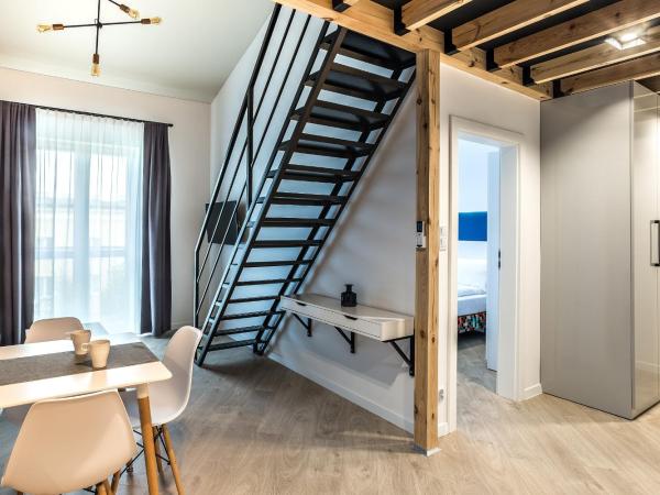 Apartamenty Nowa Kamienica Częstochowa Centrum Szymanowskiego 22A : photo 7 de la chambre appartement en duplex