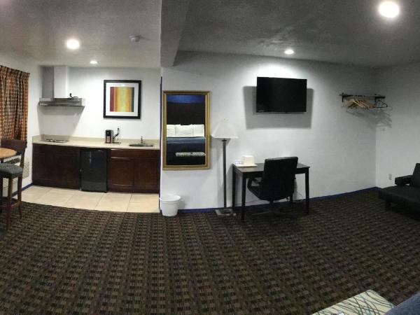 Budget Inn & Suites : photo 7 de la chambre chambre triple deluxe