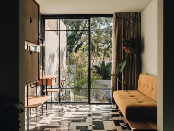 Casa Ixaya by Barrio México : photo 2 de la chambre chambre triple - vue sur jardin