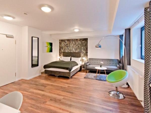 Eco Smart Apartments Nürnberg Süd : photo 5 de la chambre appartement suite confort au sous-sol avec canapé-lit