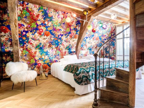 Small Luxury Hotel De Witte Lelie : photo 7 de la chambre chambre lit king-size deluxe