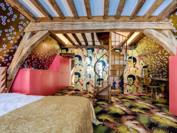 Small Luxury Hotel De Witte Lelie : photo 10 de la chambre chambre lit king-size deluxe