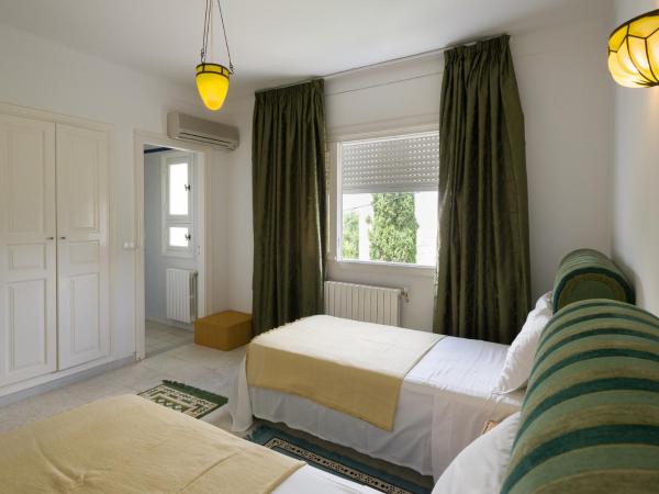Villa Phoenicia : photo 4 de la chambre chambre lits jumeaux smeraldo 