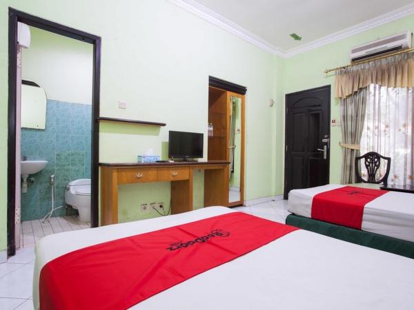 RedDoorz near Juanda International Airport : photo 1 de la chambre chambre lits jumeaux
