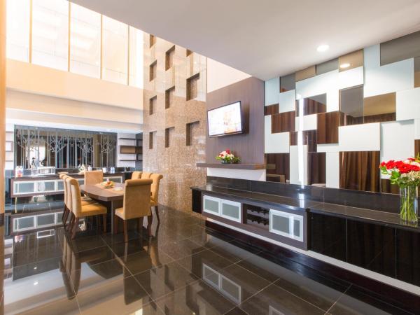 Merlynn Park Hotel : photo 2 de la chambre suite résidence