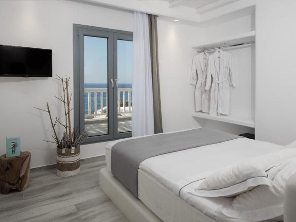 Iliada Suites : photo 2 de la chambre suite deluxe avec baignoire spa