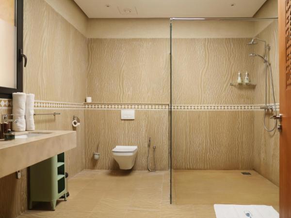 Villa Le Perroquet Bleu : photo 6 de la chambre suite lit queen-size deluxe