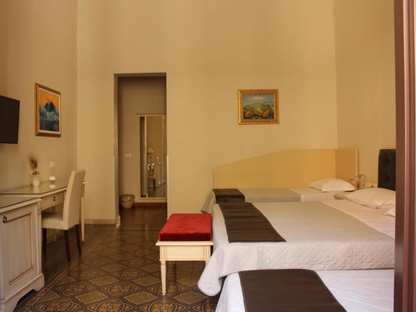 Umberto House Catania : photo 4 de la chambre chambre quadruple standard