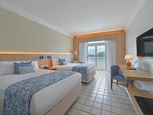 Hotel Deville Prime Salvador : photo 1 de la chambre superior luxury room with 2 double beds and partial sea view