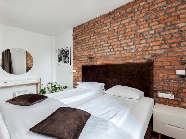 Cinema Apartments : photo 3 de la chambre appartement supérieur