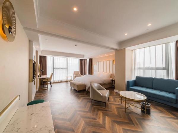 Metropolo Jinjiang Wuhan Optics Valley Science and Technology Exhibition Center : photo 5 de la chambre elegant business suite