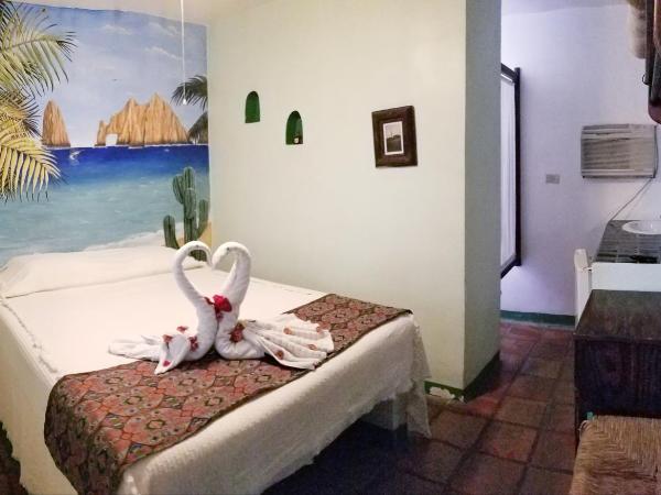 Cabo Inn : photo 3 de la chambre chambre standard lit queen-size