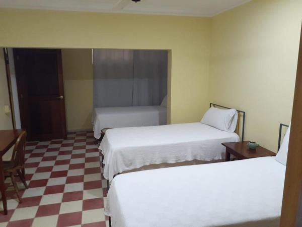 Villa Carolina Bed and Breakfast : photo 5 de la chambre chambre triple basique