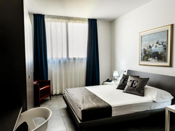 L'Essenza Hotel : photo 5 de la chambre chambre familiale