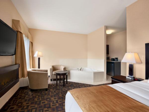 Days Inn & Suites by Wyndham Winnipeg Airport Manitoba : photo 1 de la chambre suite studio lit king-size - non-fumeurs