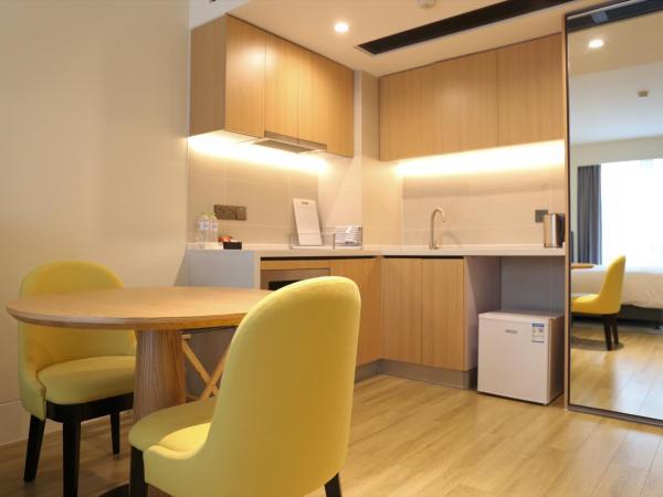 Citadines Gaoke Liangjiang Chongqing : photo 2 de la chambre studio exécutif