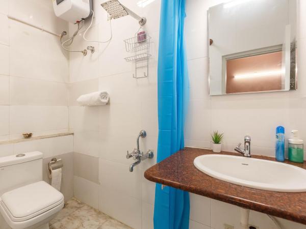 Woke HSR layout : photo 3 de la chambre chambre double deluxe avec douche