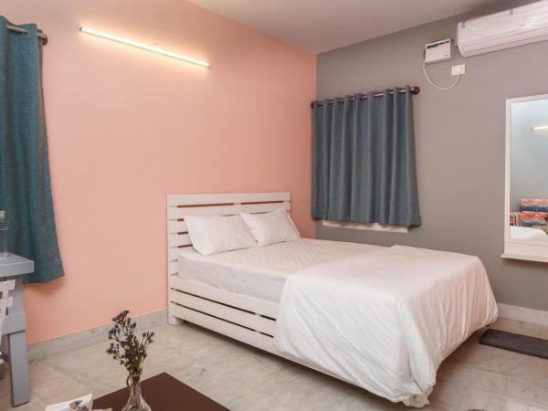 Woke HSR layout : photo 1 de la chambre chambre double deluxe avec douche