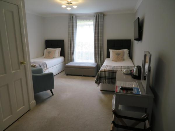 Duthus Lodge Guest House : photo 1 de la chambre chambre lits jumeaux standard avec vue sur jardin