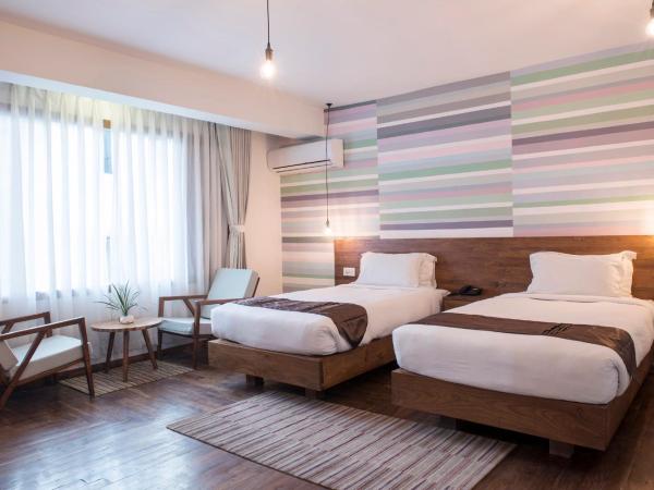 Potala Guest House : photo 6 de la chambre chambre lits jumeaux deluxe