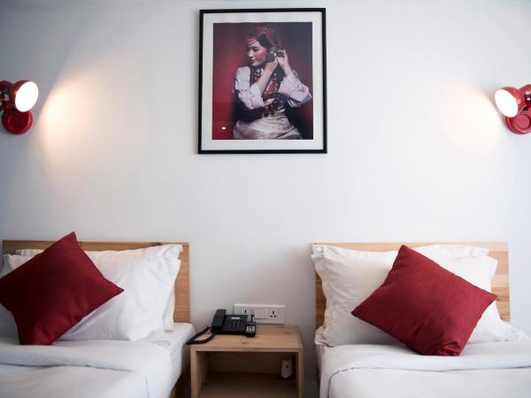 Potala Guest House : photo 6 de la chambre chambre double ou lits jumeaux supérieure