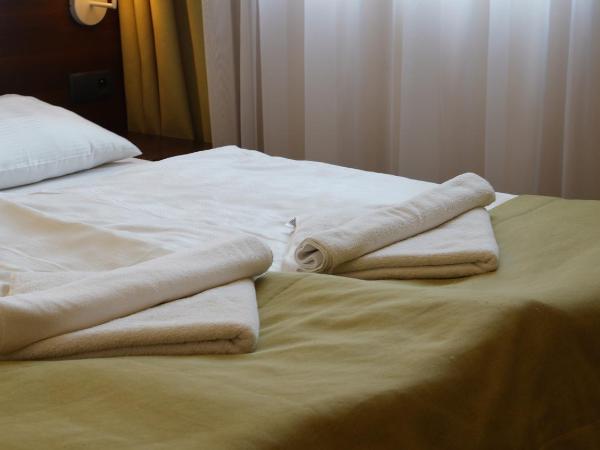 Aparthotel Lumen : photo 1 de la chambre chambre lits jumeaux