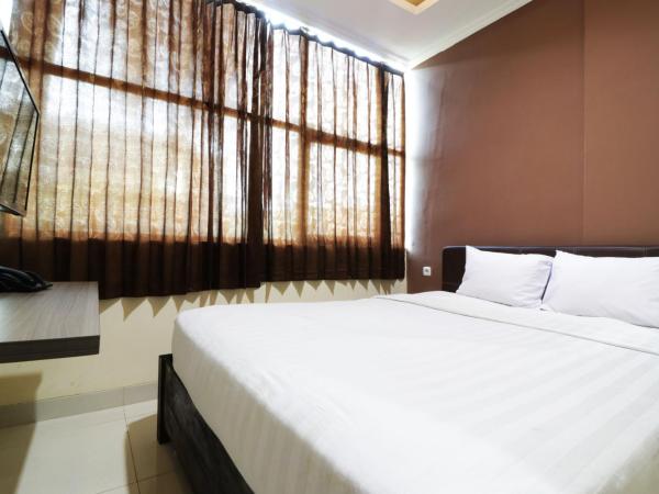 Hotel Istana Bungur : photo 2 de la chambre chambre double ou lits jumeaux supérieure