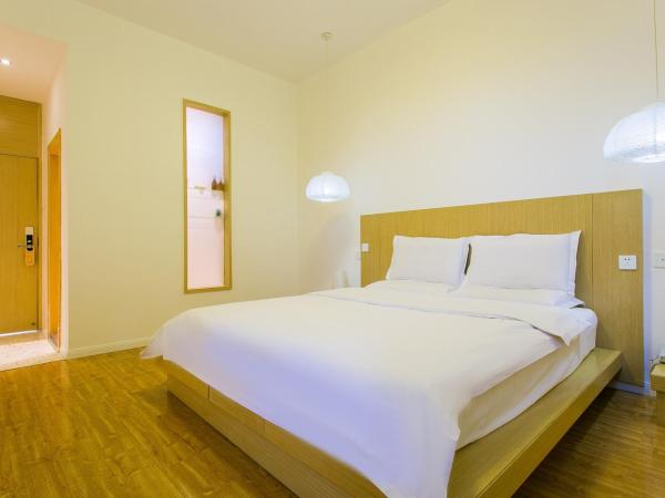 HOME++ Xi'an : photo 3 de la chambre chambre standard lit queen-size