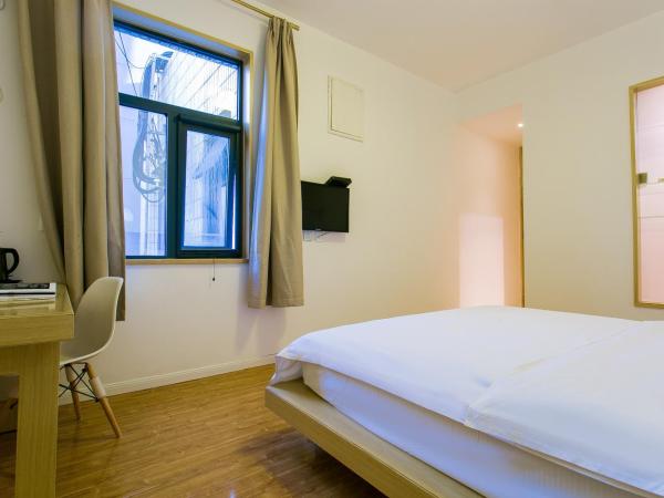 HOME++ Xi'an : photo 6 de la chambre chambre standard lit queen-size