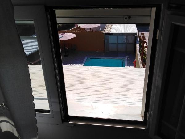 Souvlakis Pool Suites (S.P.S) : photo 7 de la chambre appartement avec balcon
