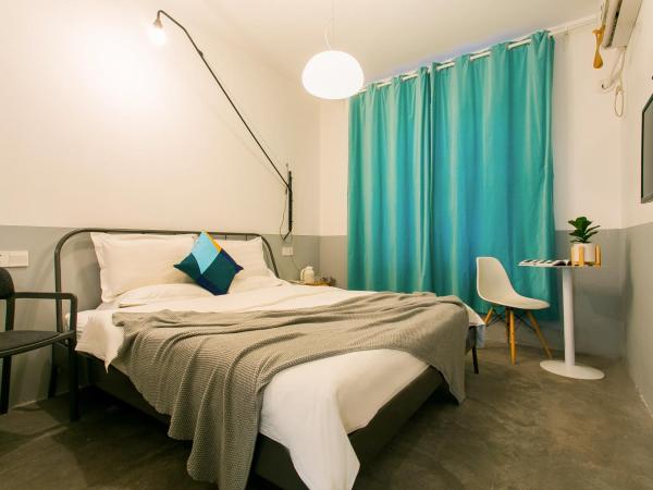 HOME++ Xi'an : photo 2 de la chambre deluxe room with private bathroom - love letter 