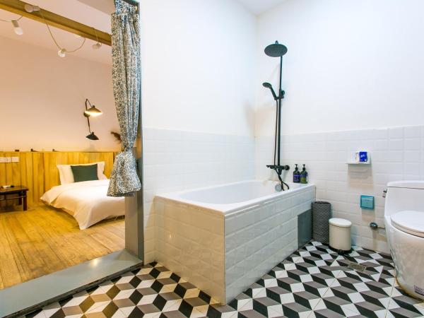 HOME++ Xi'an : photo 2 de la chambre chambre deluxe avec salle de bains privative - spring rhythm 